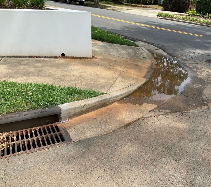 Standing water blocking a pedestrian access route
